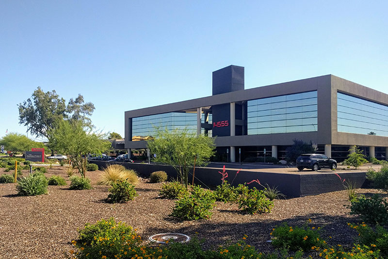 Office building at 14555 N. Scottsdale Road under a clear Arizona sky